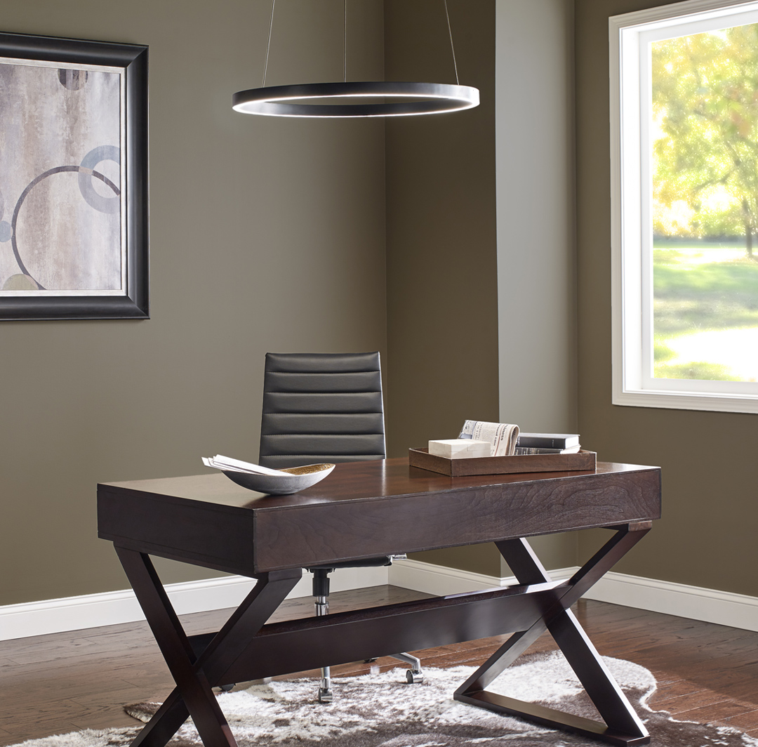 Inspiration office workspace with brown walls and white trim, wooden desk, small image.