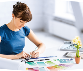 Photo of woman looking at paint chips