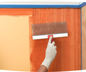 Person creating faux straight lines with paint brush